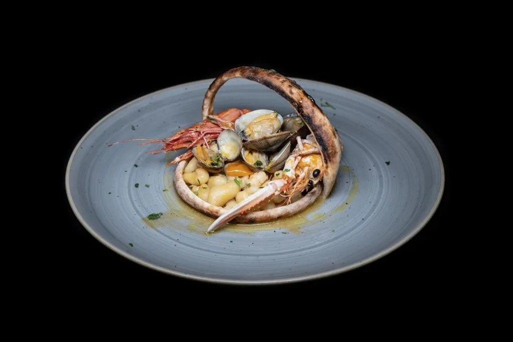 cavatielli fatti a mano produzione propria con frutti di mare e datterino giallo